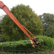 Flail mulcher maintaing hedges